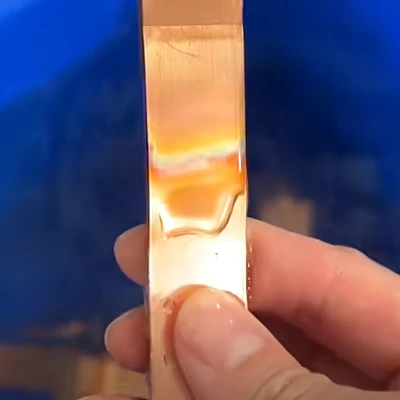 Copper foil flexible connector after welding and DI water cooling showing a bright copper surface